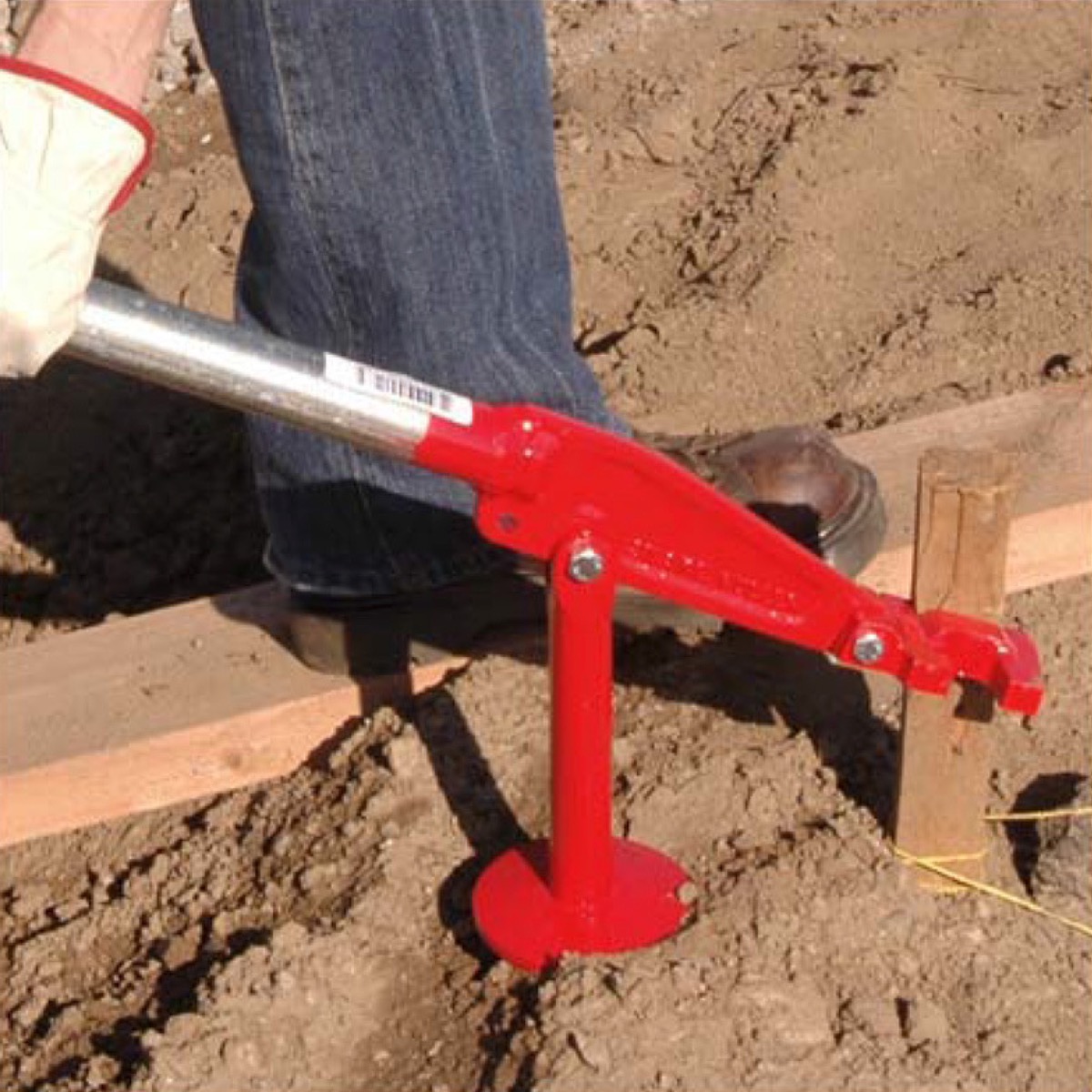 Stake extractor for removing stakes in the construction industry. Speedcrete, United Kingdom.